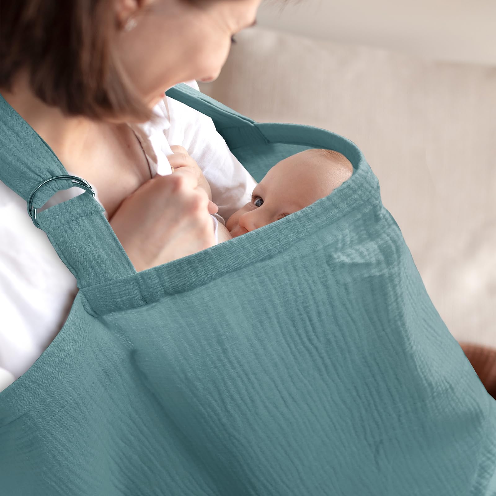 Hooyax nursing cover on the go supports discreet breastfeeding.