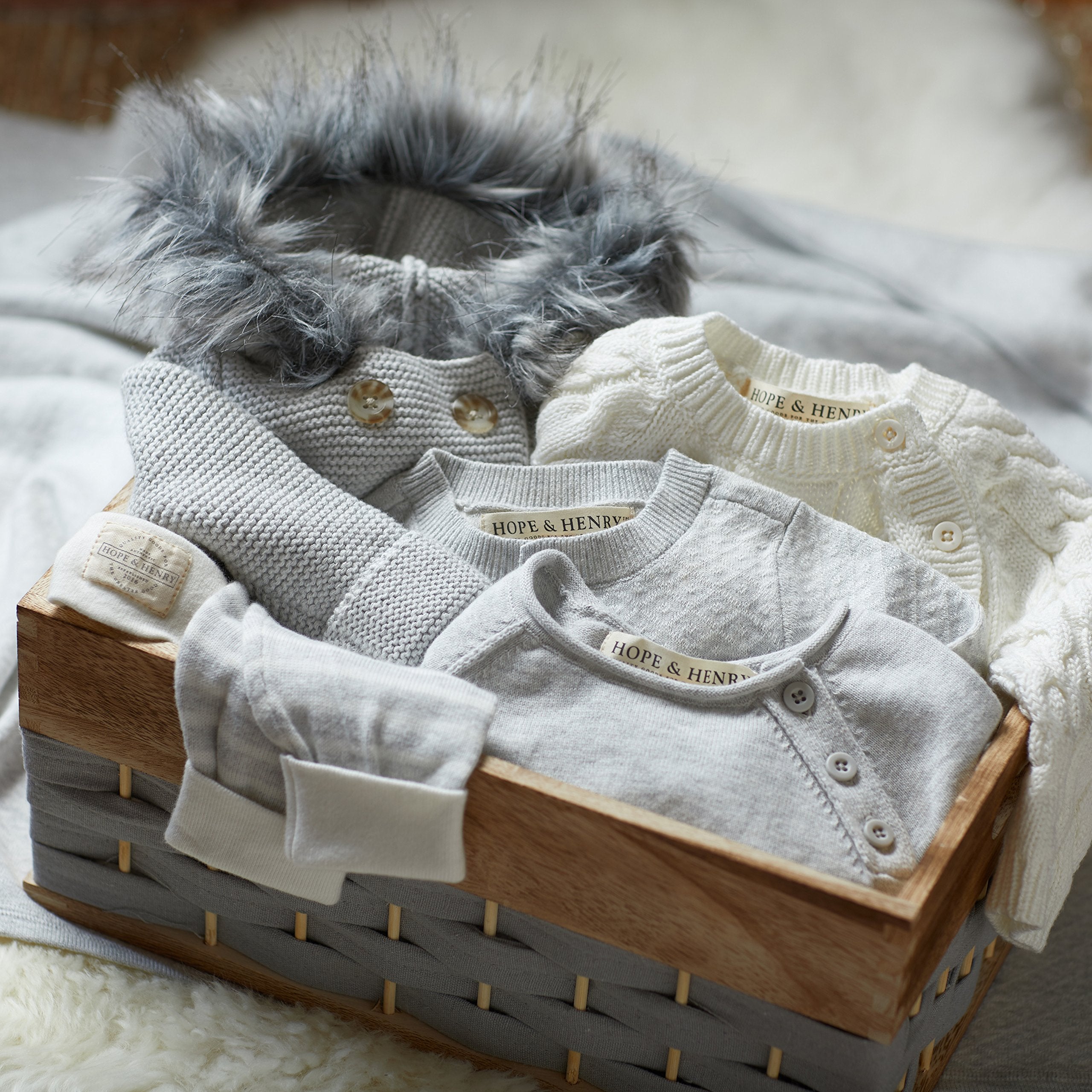 Hope & Henry Baby Jacquard Sweater Blanket packaging suggests gift-ready present.