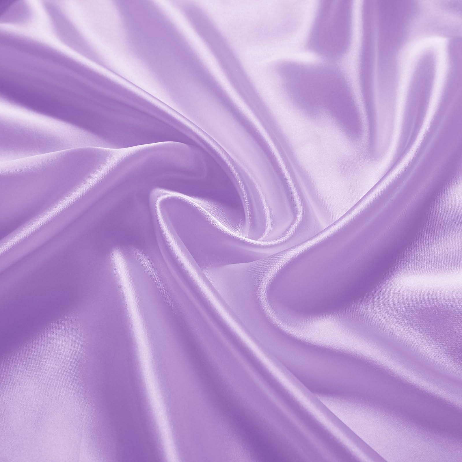Horbaunal sheets on mini crib mattress demonstrating secure elasticized corners