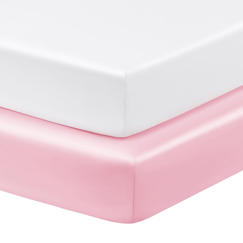 Horbaunal satin crib sheet in blush pink close-up showing silky texture for baby comfort