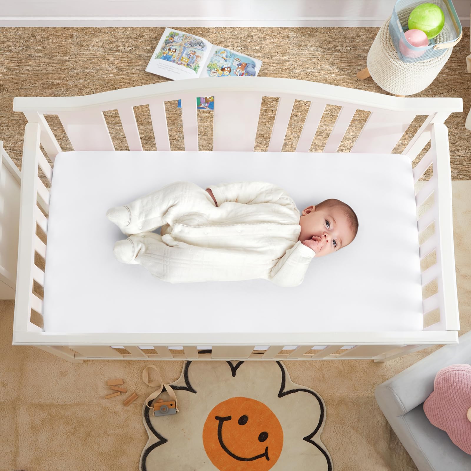 Horbaunal satin pack n play sheet placed on baby mattress for easy setup.