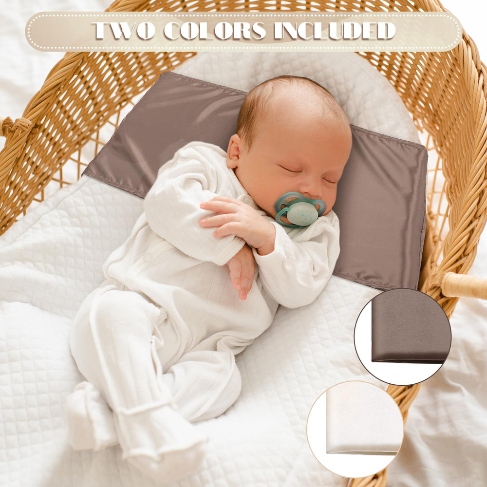 Hosuly satin bassinet sheet band-fit close-up demonstrates secure mattress edge wrap.