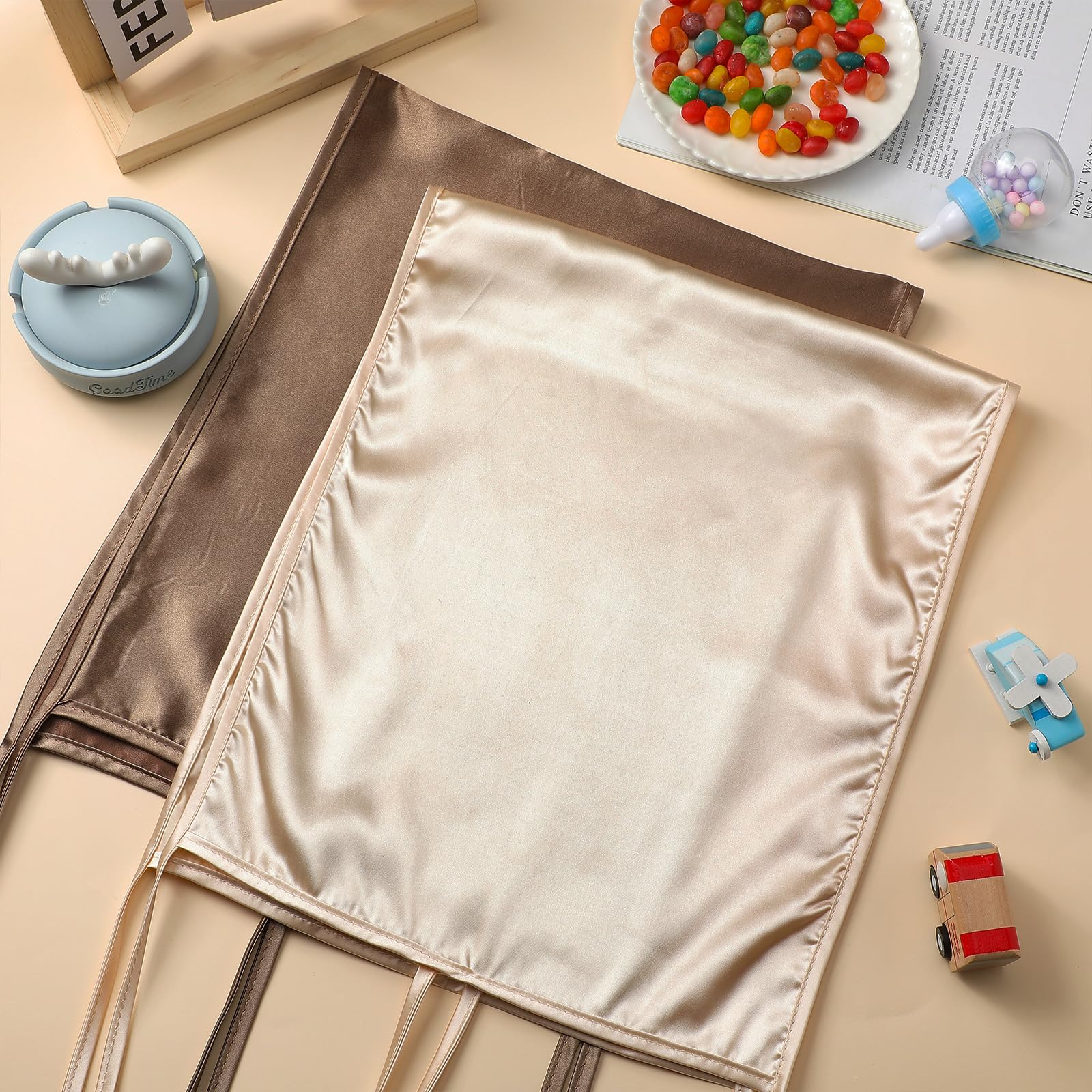 Hosuly satin bassinet sheet on mattress shows snug fit for varied mattress shapes.
