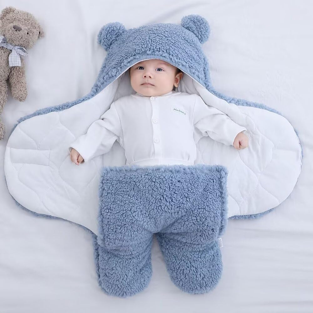 HotBlizi dual-layer swaddle with outer flannel and inner cotton for warmth and breathability.