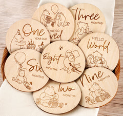 Houism Winnie monthly marker front view with Hello World sign for baby photo sessions