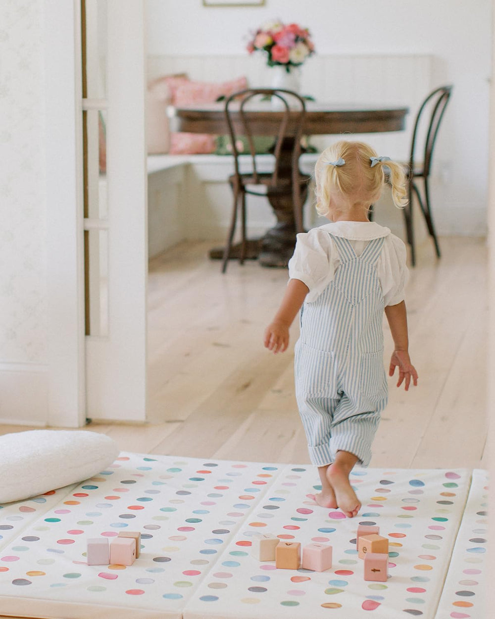 House of Noa mat supports active play, tumbling, and floor exercises.
