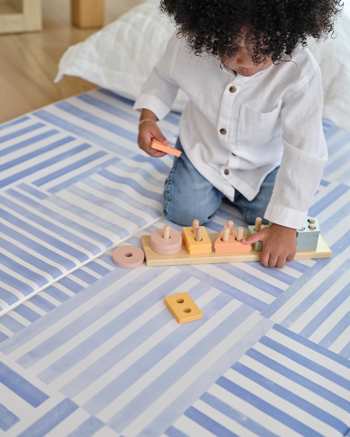 House of Noa Hadley portable play mat for home or travel.