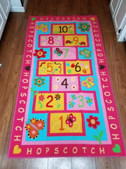 HUAHOO pink girls rug nursery decor brightens the space