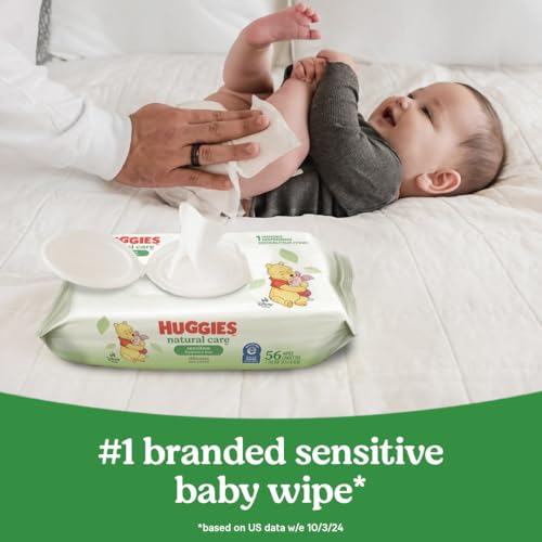 Huggies Natural Care Sensitive packaging with Disney patterns on changing table.