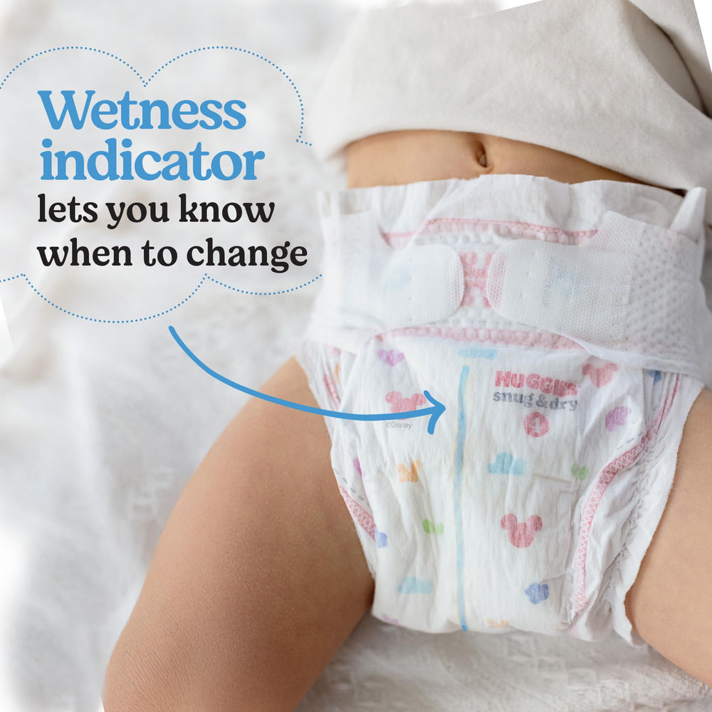 Huggies Snug & Dry wetness indicator signals when a diaper change is due