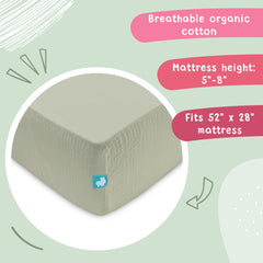 Hugs & Llamas olive muslin on a standard US crib mattress for sizing