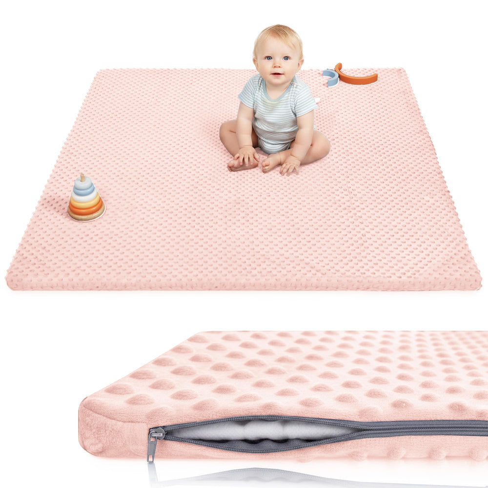 Huloo Sleep pink cover mat provides a soft, safe crawling surface.