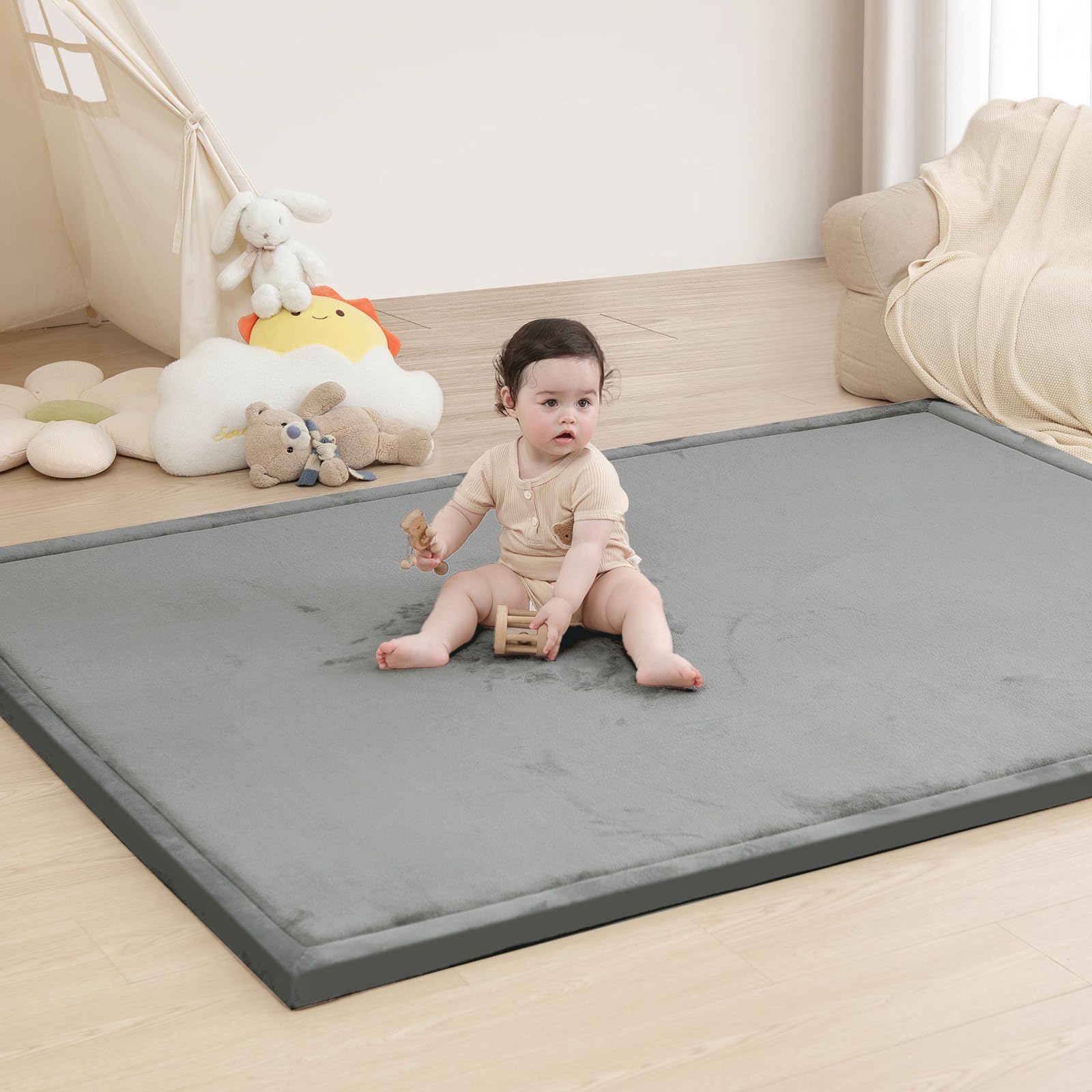 Huloo Sleep baby play mat with 1-3 inch thick memory foam for comfy tummy time.