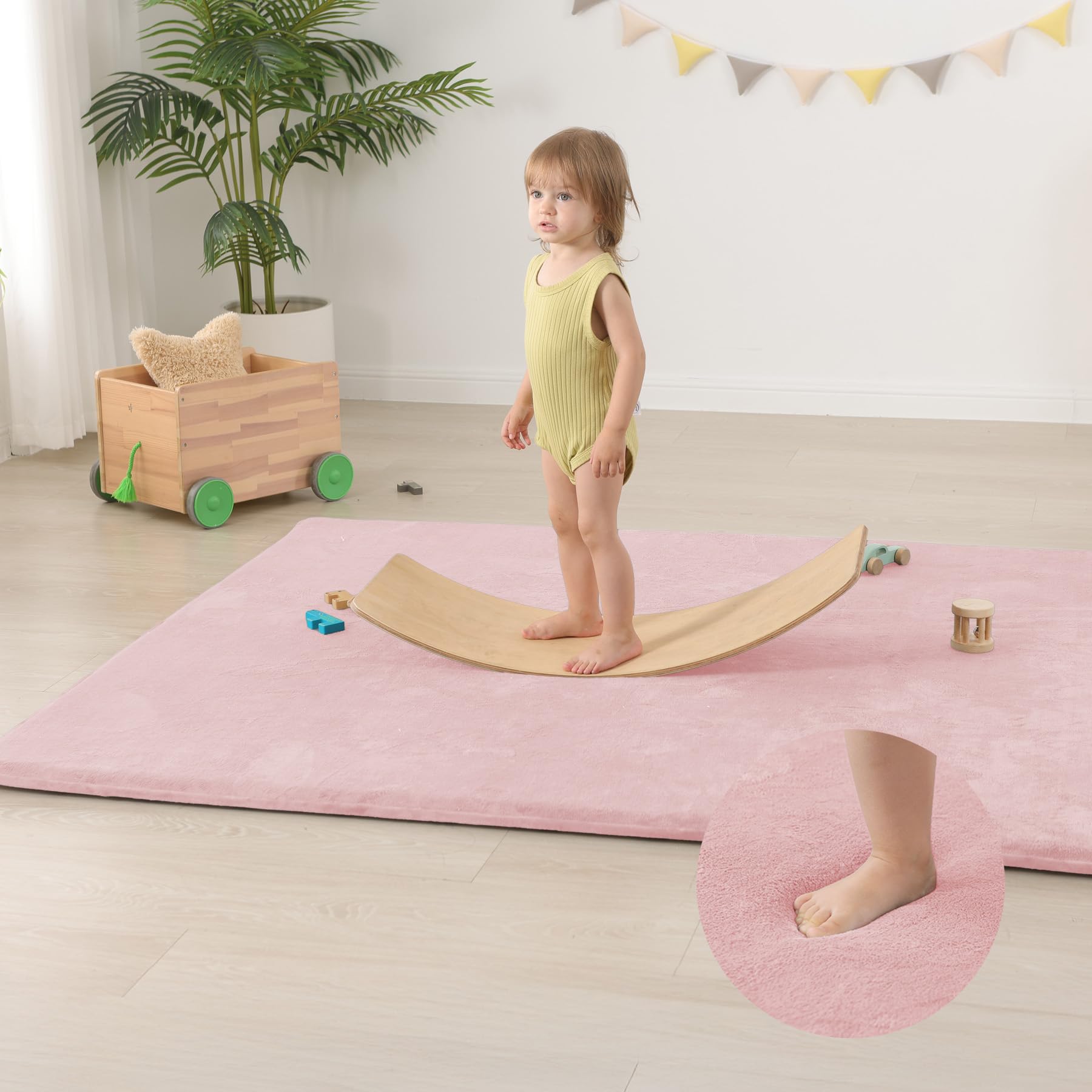 Tummy-time area on Huloo Sleep mat supports gentle supervised play.