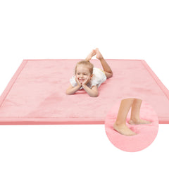 Huloo Sleep baby play mat pink close-up highlighting ultra-soft surface for tummy time.