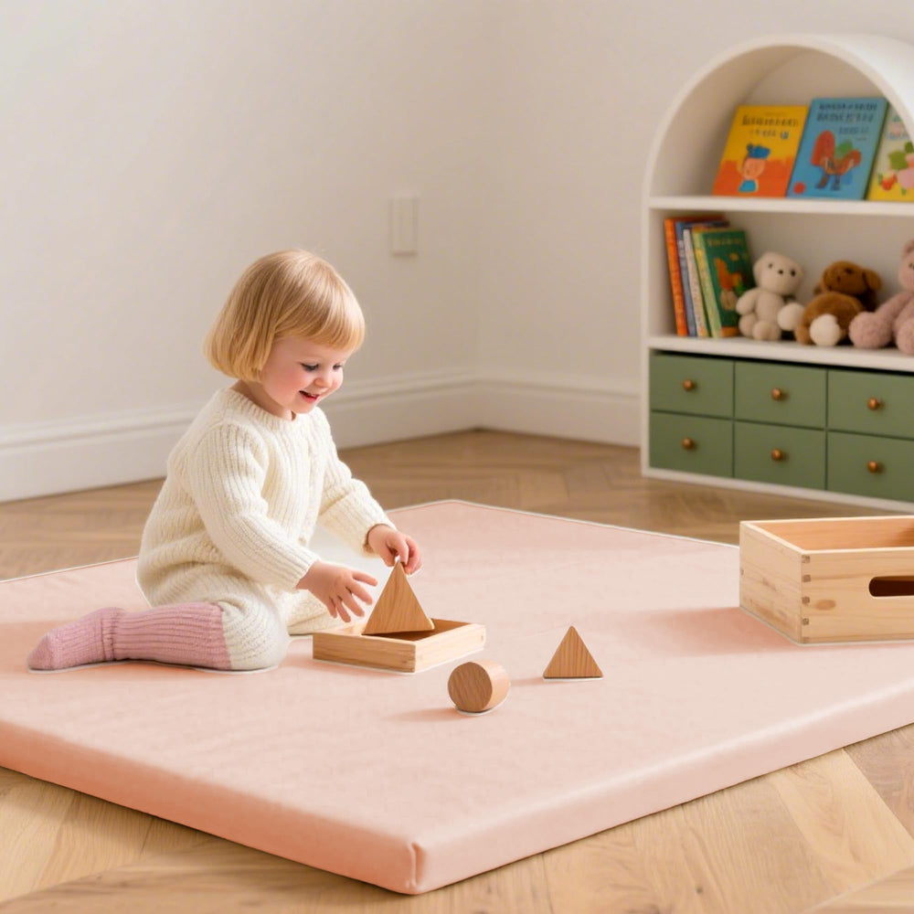 Huloo Sleep pink play mat placed in a nursery or playroom