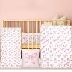 HunnmingRe pink bow crib bedding set flat lay for a cozy nursery setup