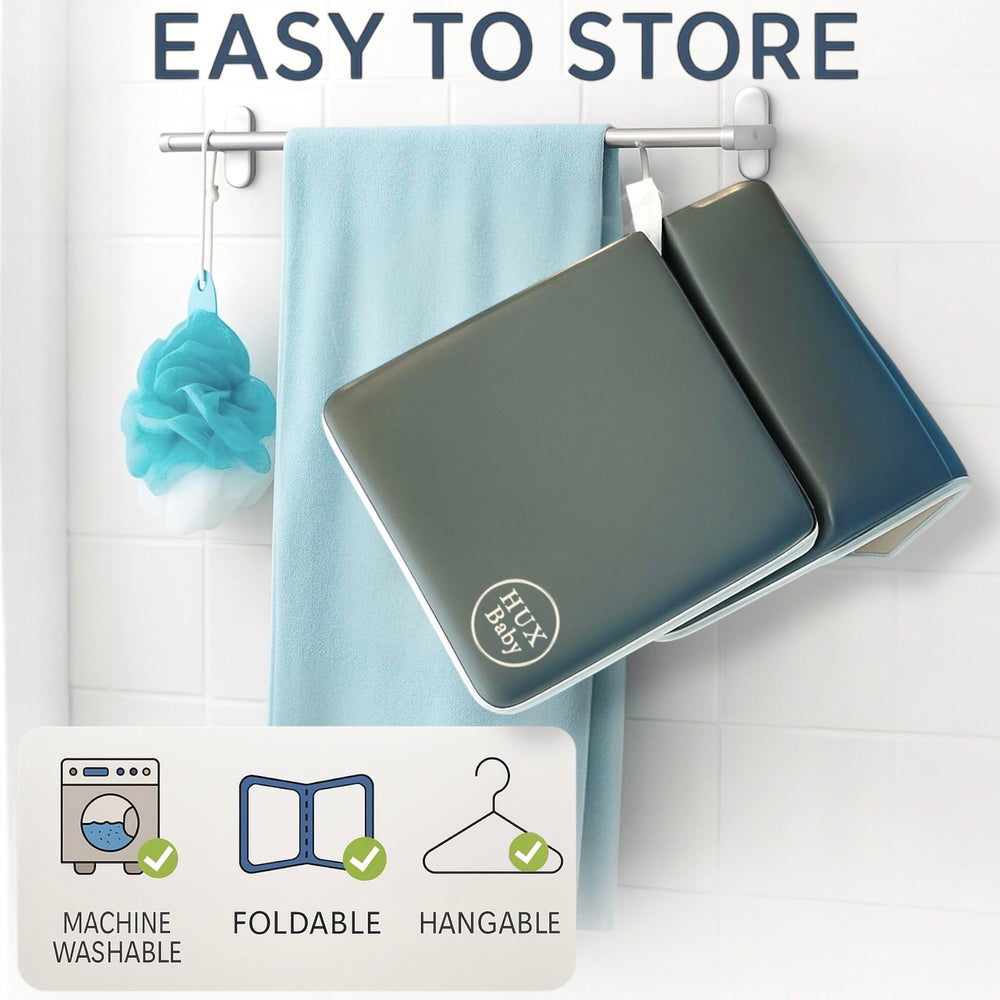 HUX Baby strong suction cups securing kneeler to tub surface.