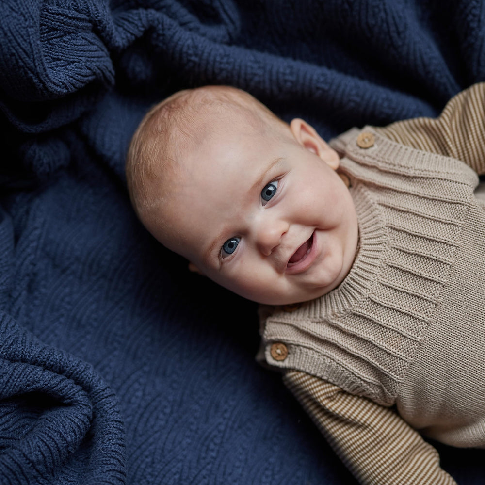 Huxie 30x40 blanket in North Sea Blue, perfect for crib and stroller.