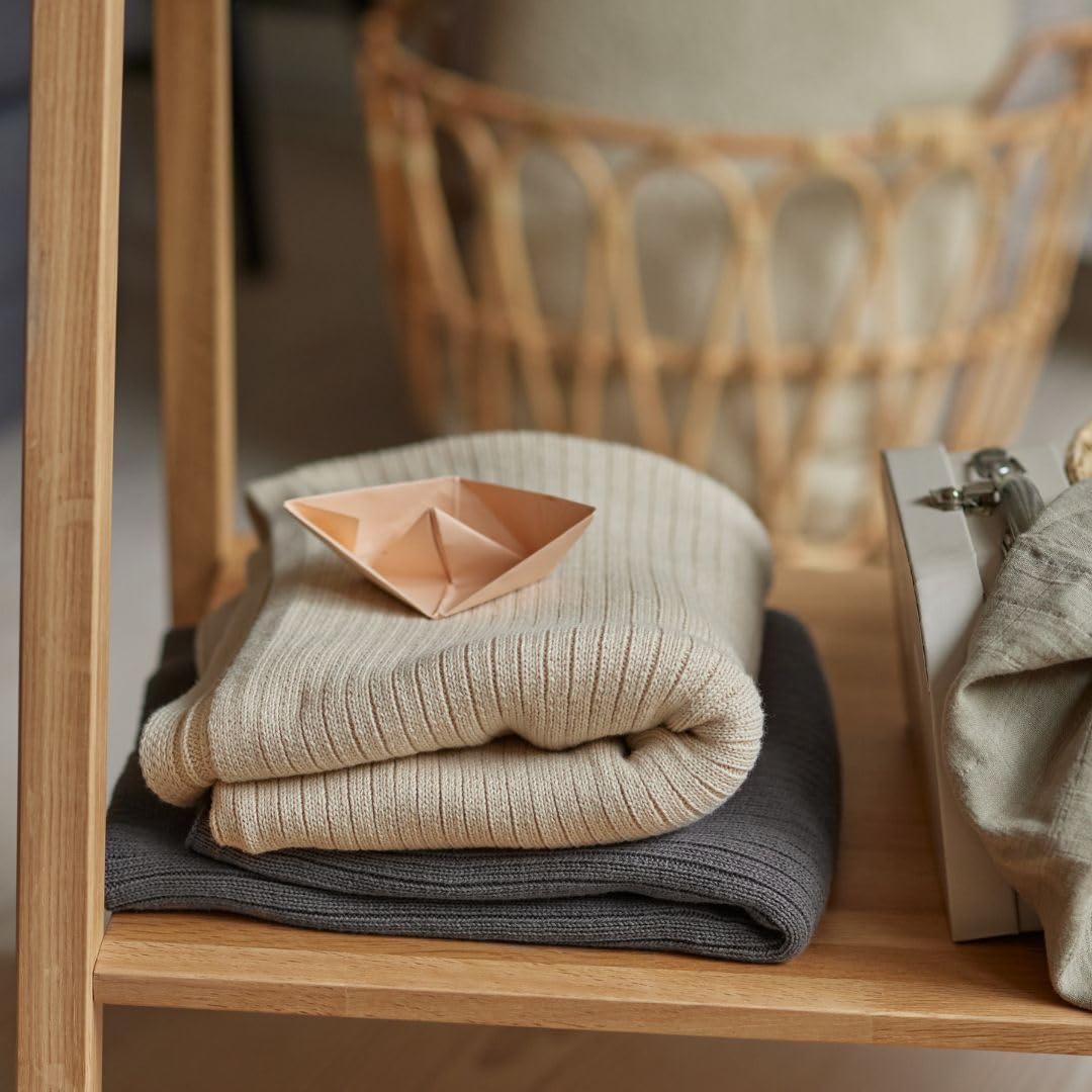 Huxie organic cotton blanket soft fabric for year-round use.