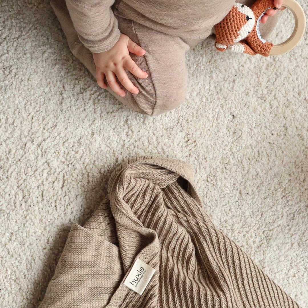 Huxie fog color blanket ideal for stroller outings.