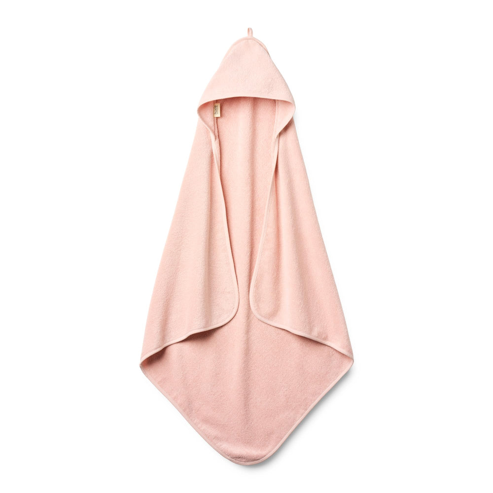 Huxie baby hooded towel in organic cotton, plush and gentle for delicate skin.