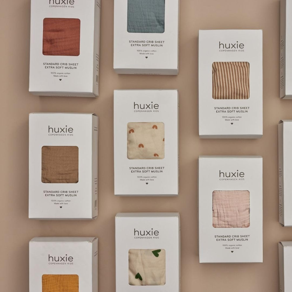 Huxie crib sheets machine washable for easy care and quick drying.