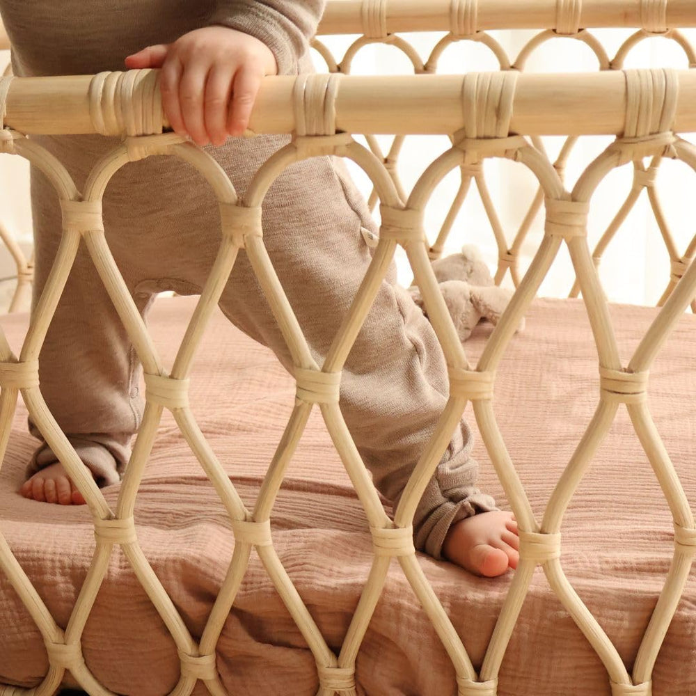 Huxie crib sheets natural color suits a calm, timeless nursery.