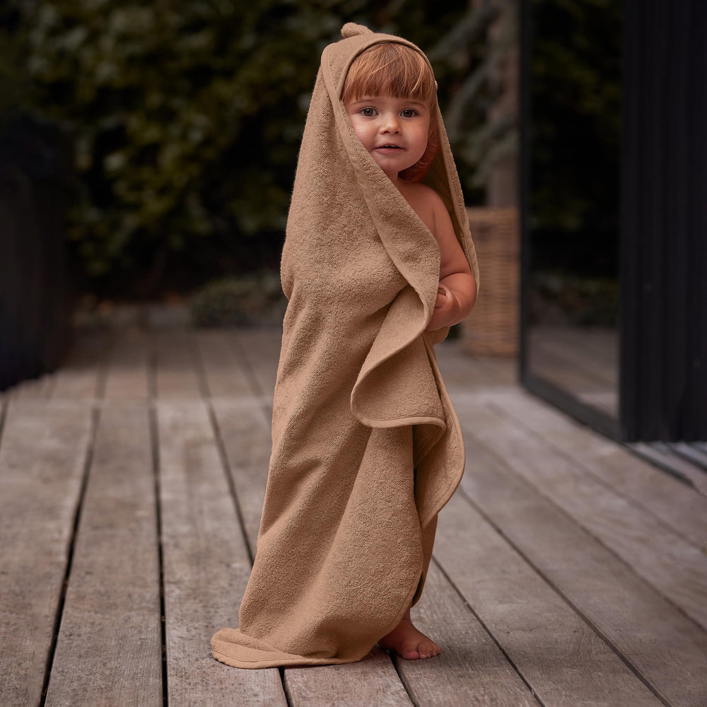 Huxie gender-neutral bear design suits any nursery.