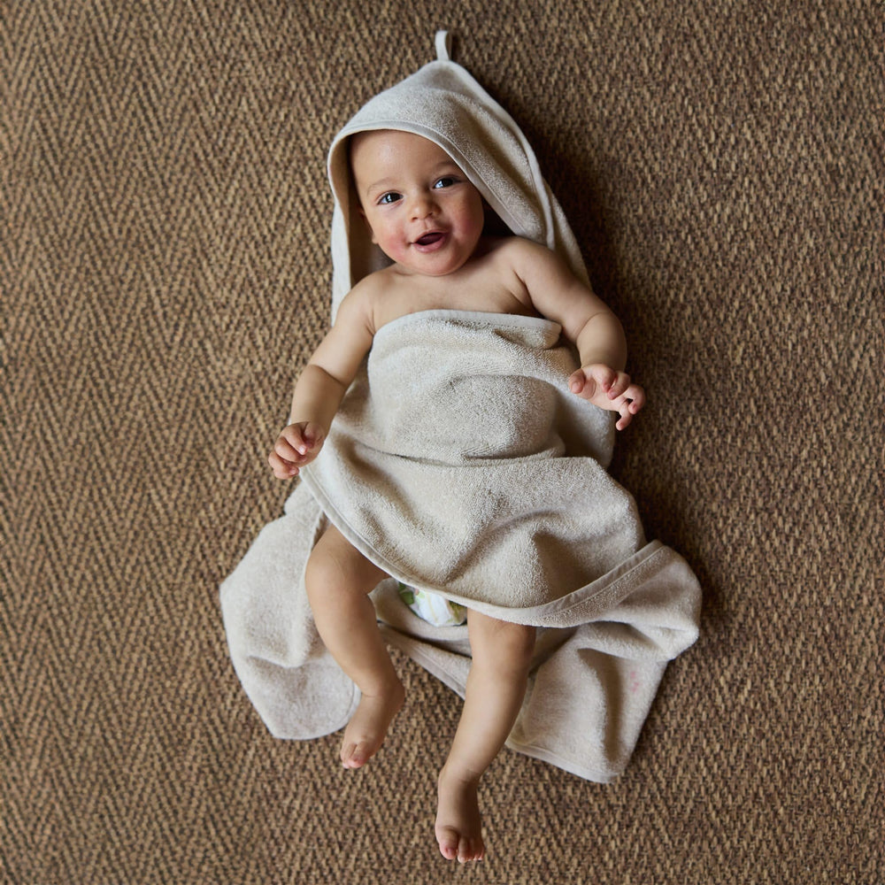 Huxie Hooded Baby Towel 32x32 dimensions ideal for growing babies.