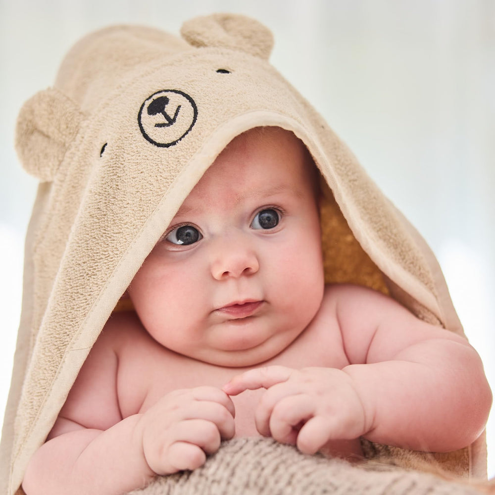 Huxie hooded towel hood and corner detail for secure coverage