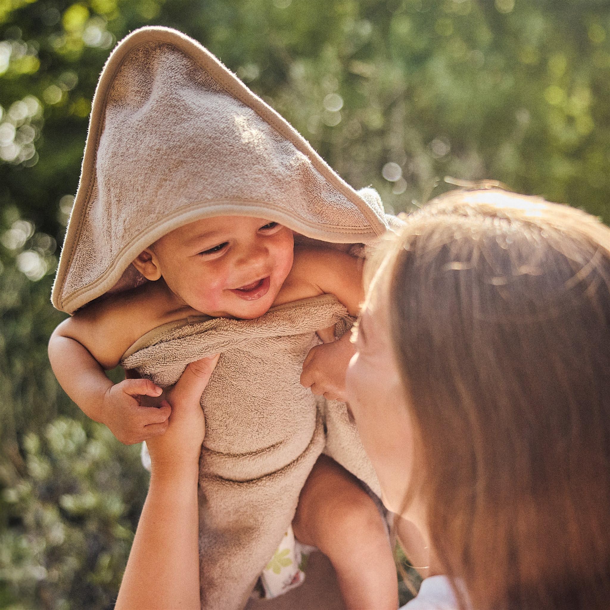 Huxie hooded towel close-up showing organic cotton softness