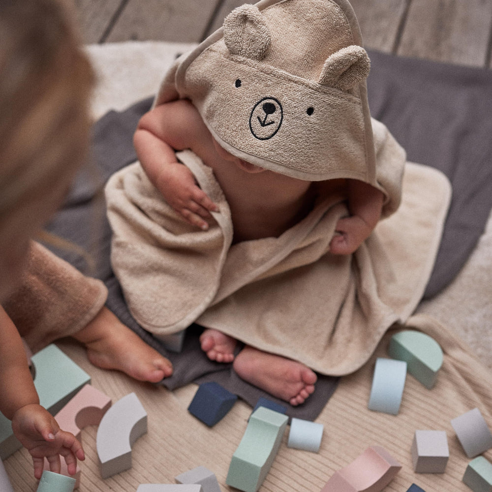 Huxie Hooded Towel 32x32 size grows with baby from newborn to toddler.