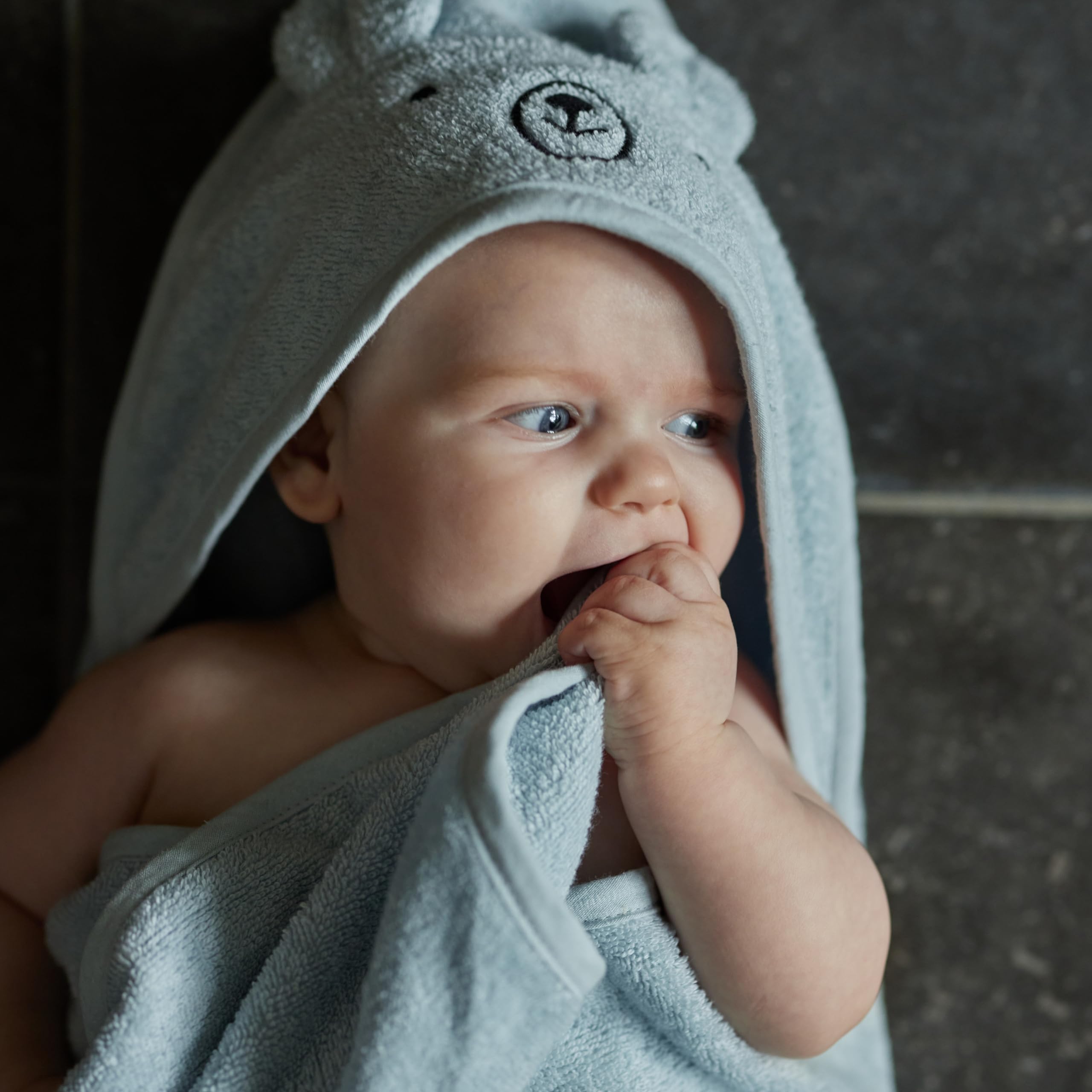 Huxie hooded towel fabric detail emphasizes softness and durability.