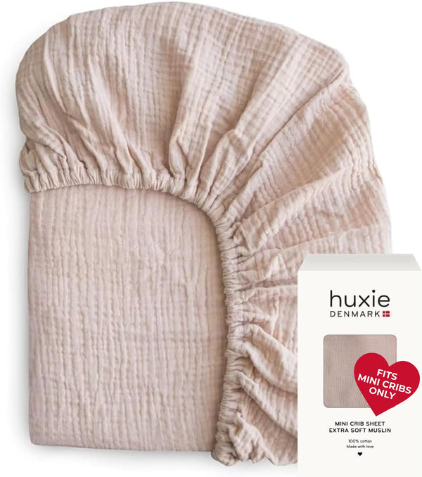 Huxie mini crib sheet 24x38 on a pack-and-play for quick changes.