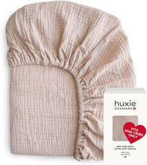 Huxie mini crib sheet 24x38 on a pack-and-play for quick changes.