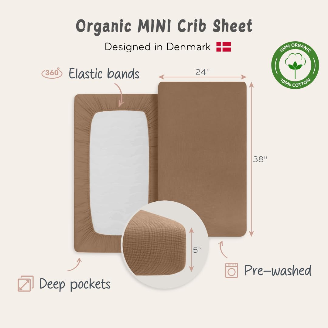 Huxie mini crib sheet elastic-edge secure-fit image highlights full-edge stretch.