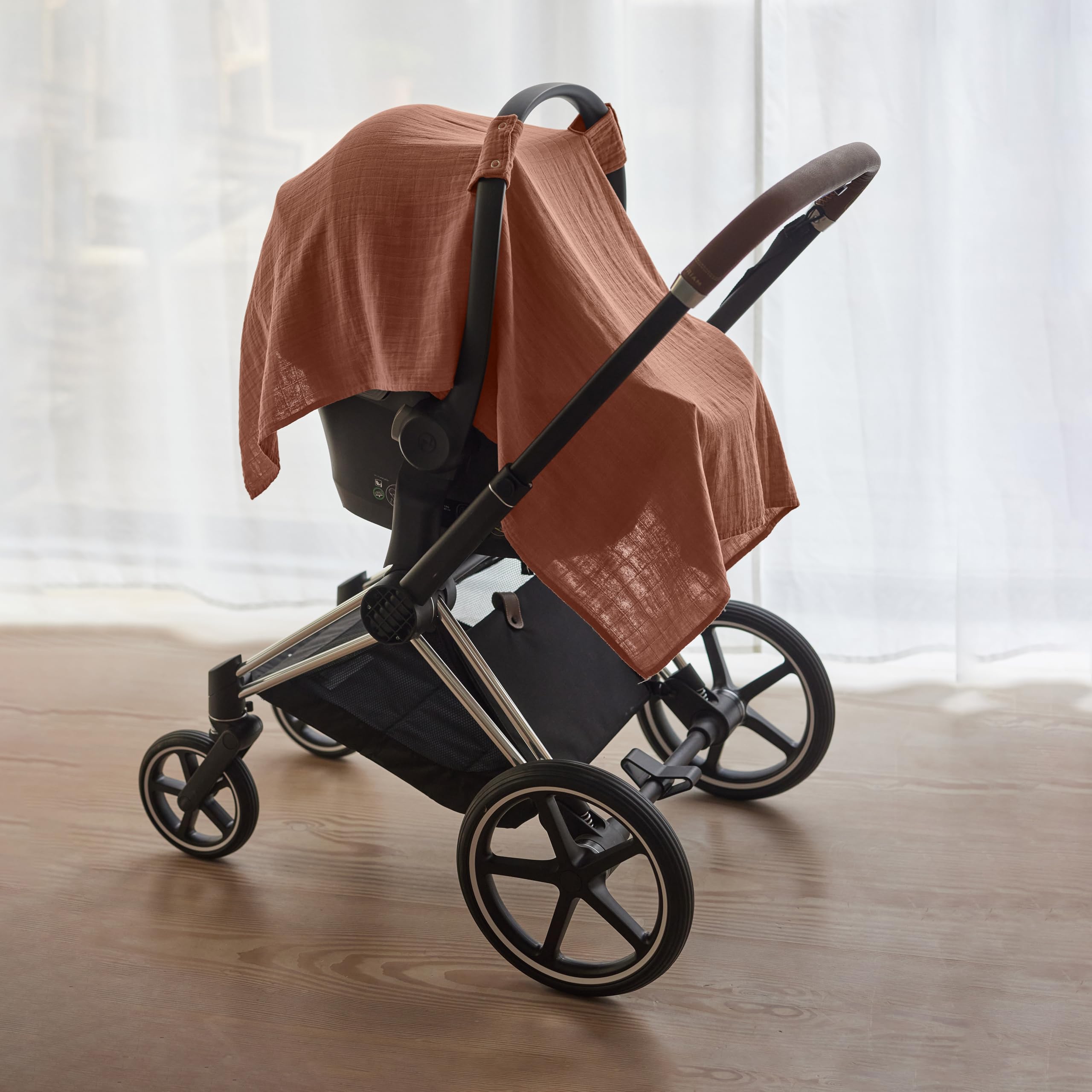 Huxie nursing cover on the go preserves privacy during feeding.