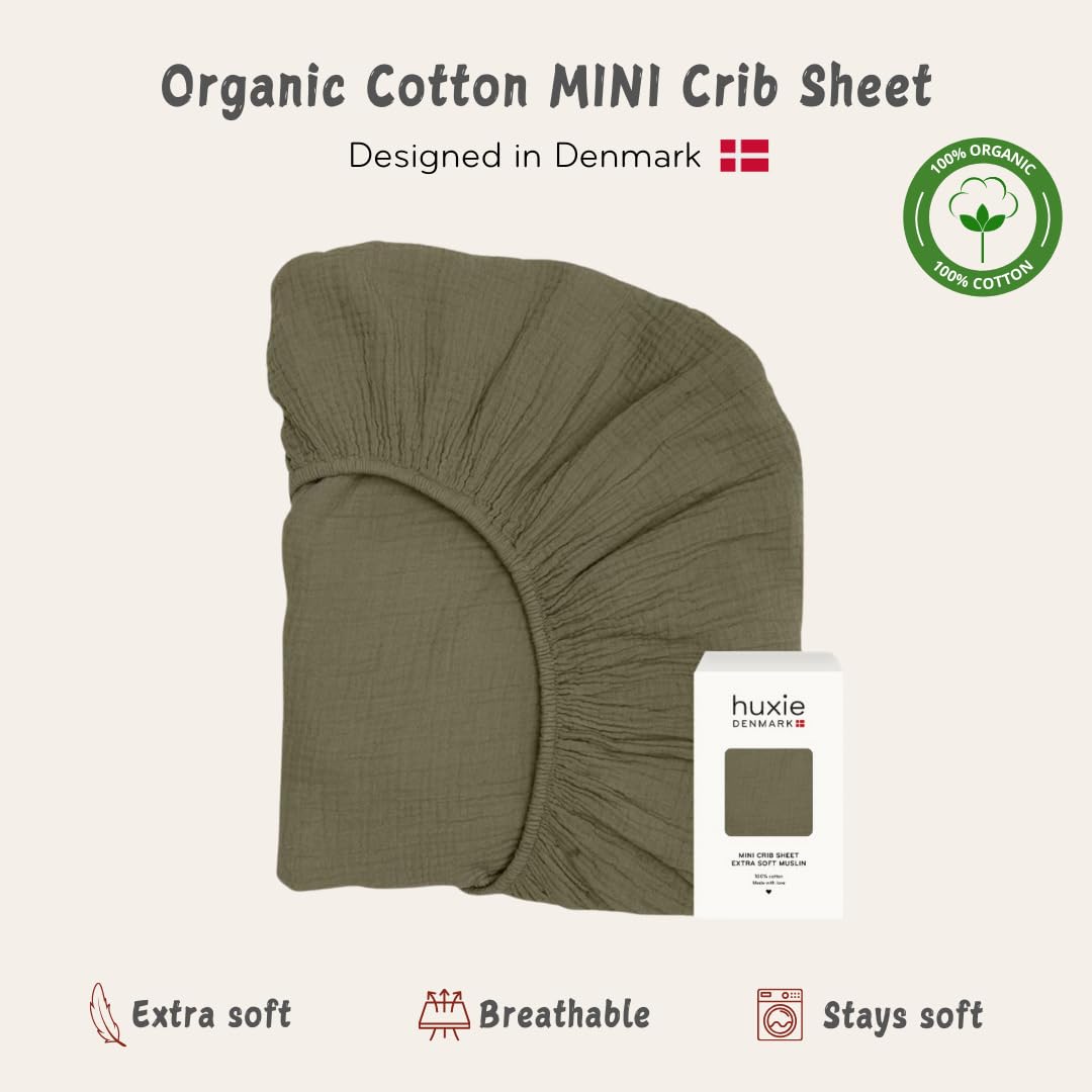 Huxie Sage Green mini crib sheet in use with coordinated bedding for boys and girls