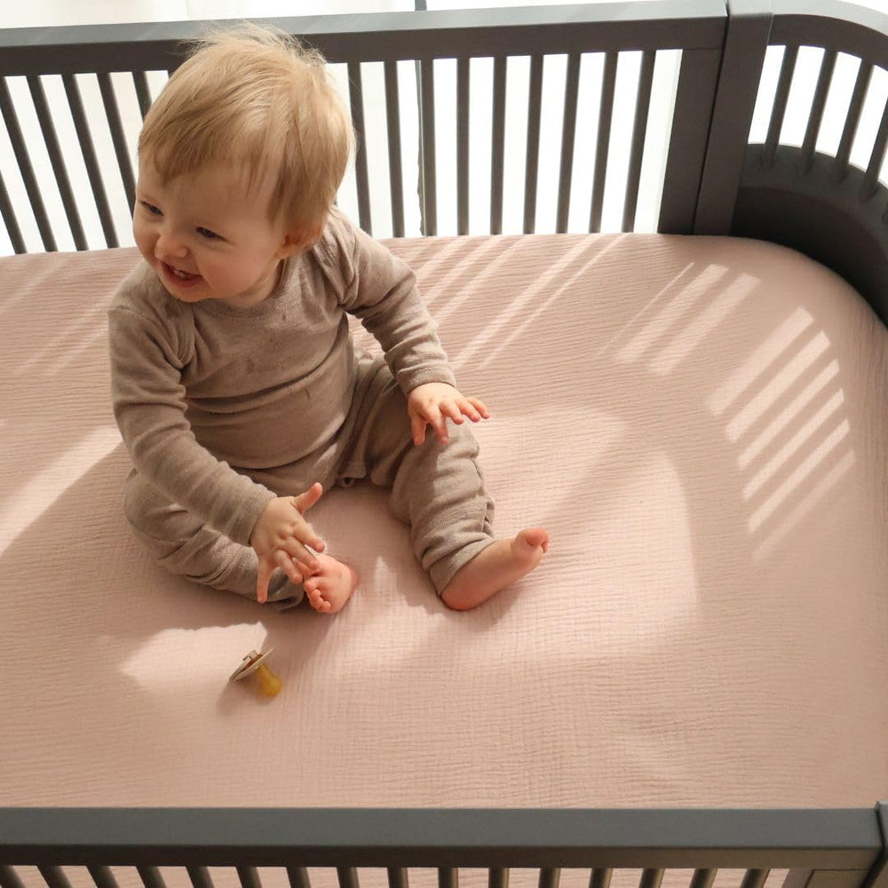 Soft breathable Huxie crib sheet ideal for baby comfort.