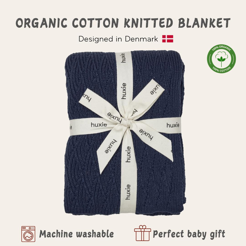 Huxie swaddle blanket for receiving, warmth on the go.