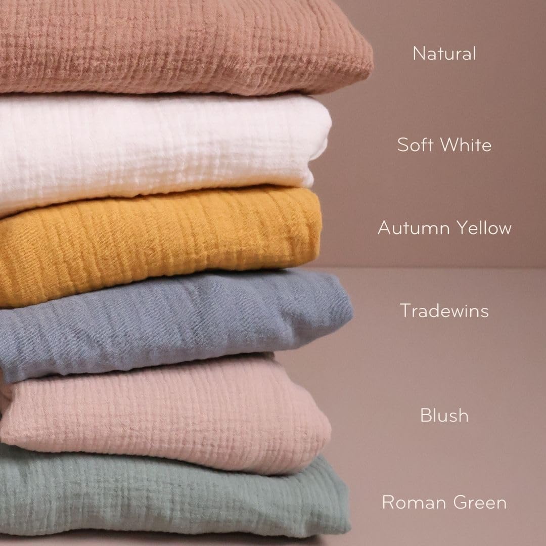 Two-year warranty on Huxie mini crib sheet highlights durability.