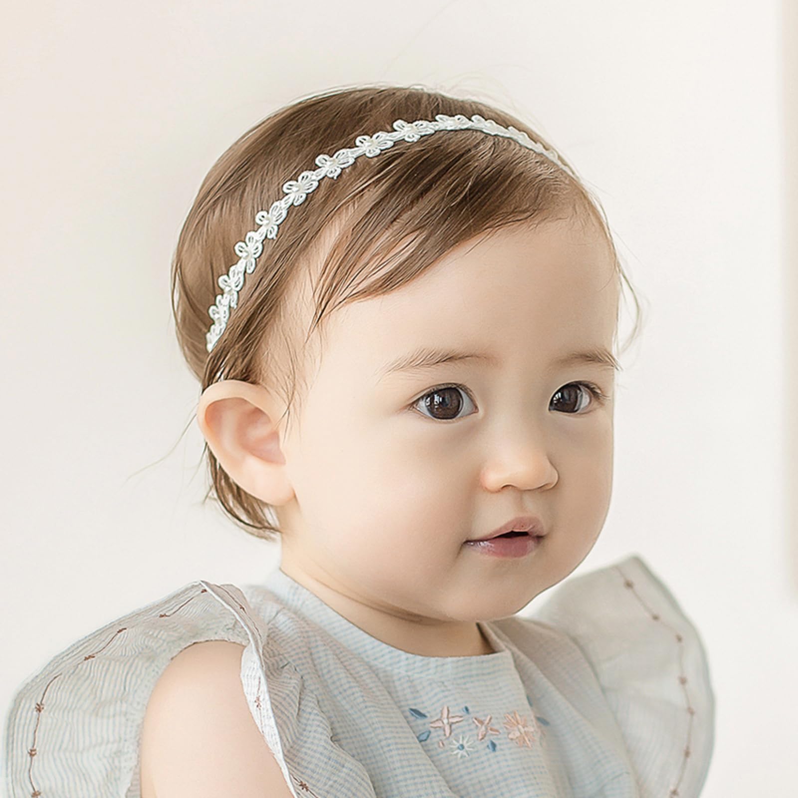 ICKEYOU daisy accent hairband on soft elastic band for gentle wear