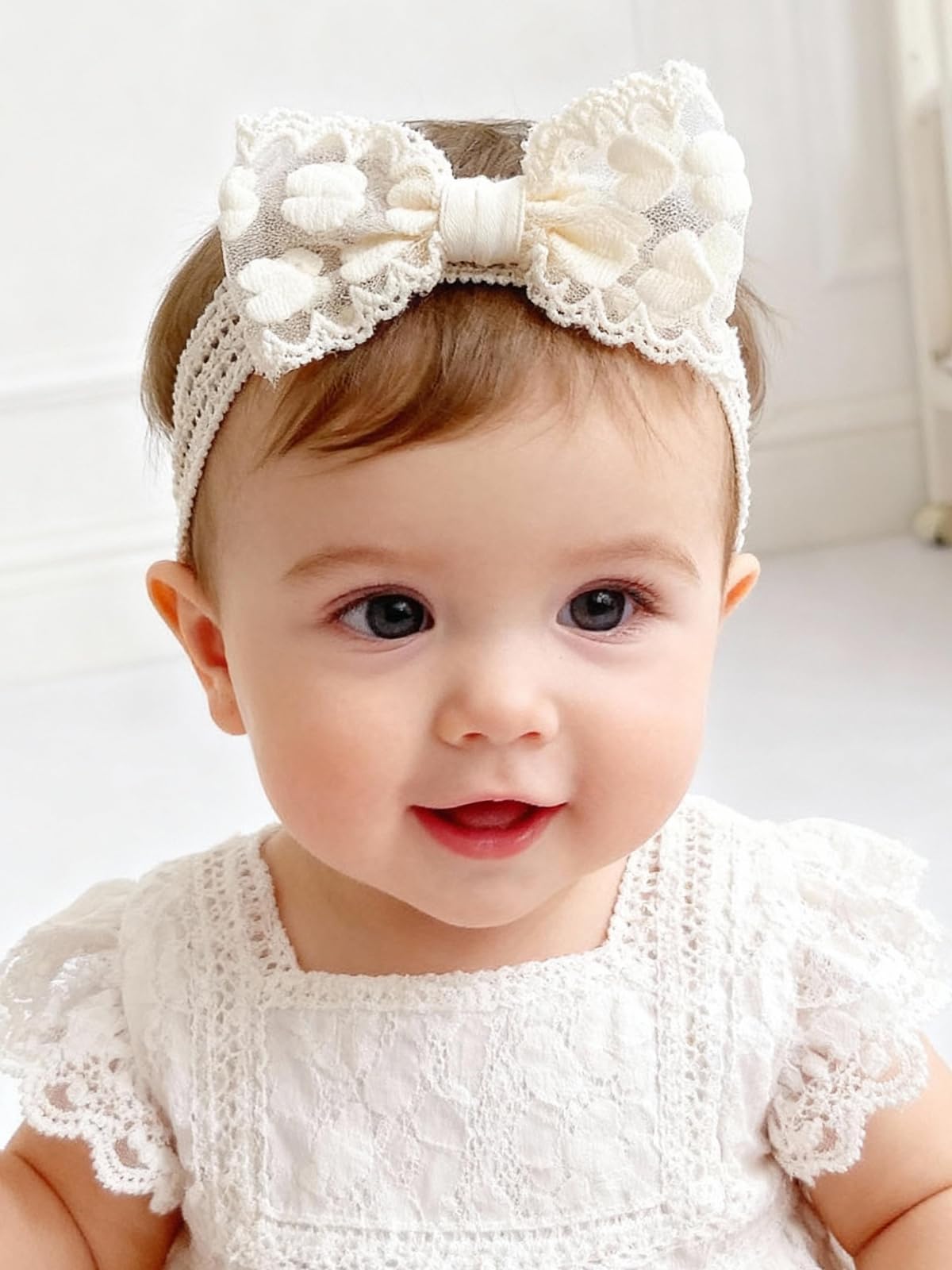 icke-you white butterfly knot headband; soft, breathable and ideal for special occasions.