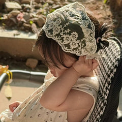 ICKEYOU beige floral headband on a baby for photoshoots