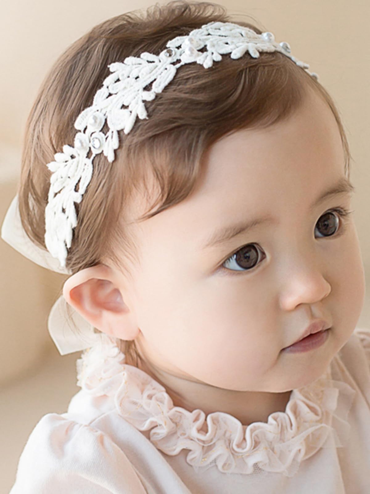 ICKEYOU white bow lace headband for baby girls enhances photos with timeless charm.