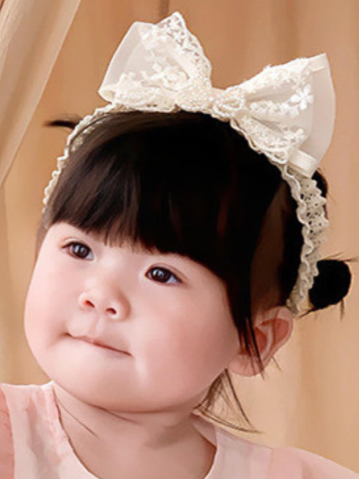 ICKEYOU baby girls hairband with white lace bow for everyday wear and photos.