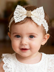 ICKEYOU beige bow headband for soft, skin-friendly wear.