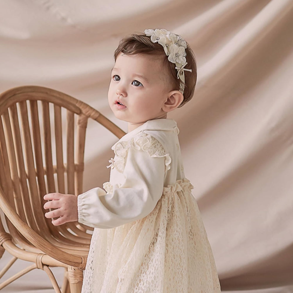 ICKEYOU wide soft-stretch headband keeps hair neatly in place during playtime.