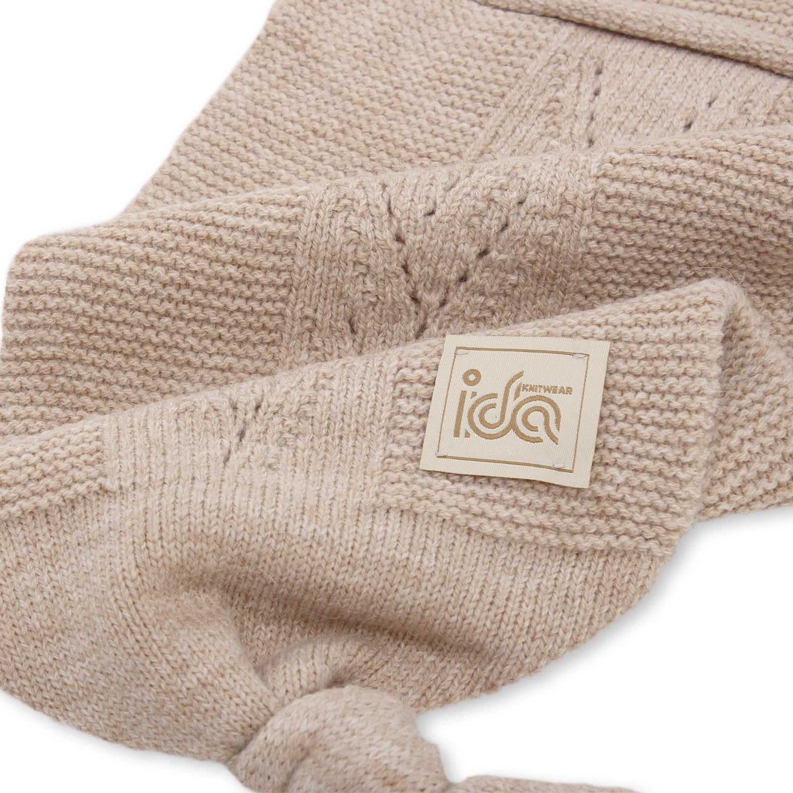 IDA KNITWEAR Cocoon Baby Blanket stone wrap demonstrates snug cocoon for calm newborns.